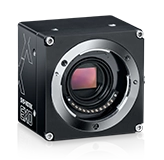 Black industrial camera with visible sensor and open MFT lens mount.