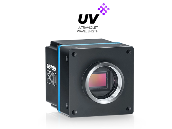 Black industrial camera with visible sensor on glossy surface.
